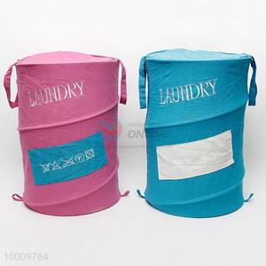 Pink linen storage basket with embroidery