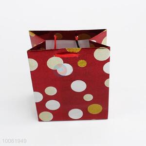 Red dot pattern hologram paper gift bag