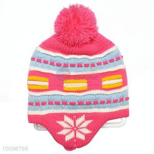 Children knitted winter hats with ball on top