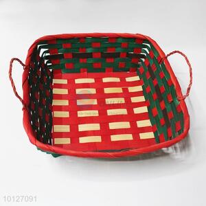 Red woven bamboo fruit basket with handle