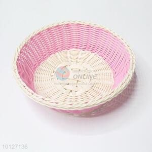 Pink rounf plastic fruit basket