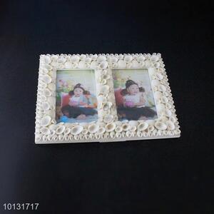 White <em>photo</em> frames with shell