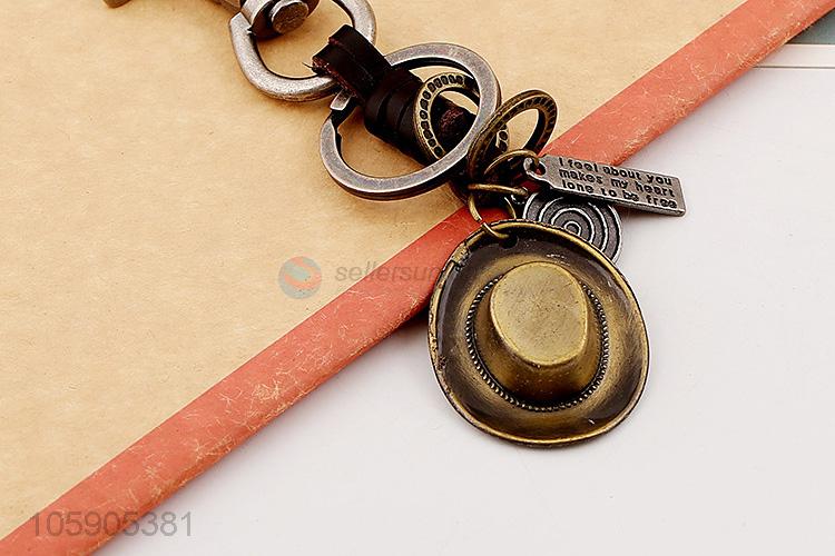 China manufacturer weave leather key chain with retro hat charms