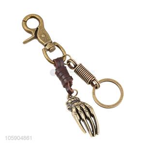 Wholesale new weave leather key chain with retro hand bone charms