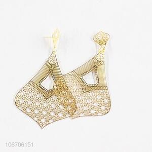 Good quality golden filigreed metal earrings fashion jewelry