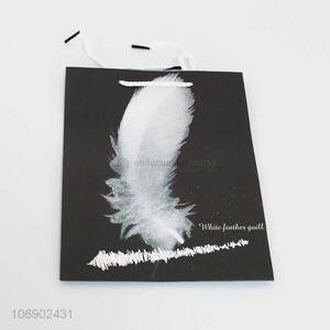 Hot sale white feather pattern <em>paper</em> gift <em>bags</em> with <em>handles</em>