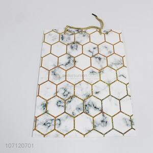 Creative marble geometric pattern <em>paper</em> gift bag with <em>handles</em>