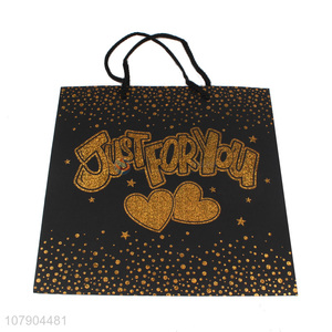 Good wholesale price golden laser hot stamping holiday gift bag