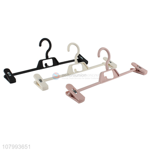 Low price solid color multi-use clothes hanger pants hanger with clips