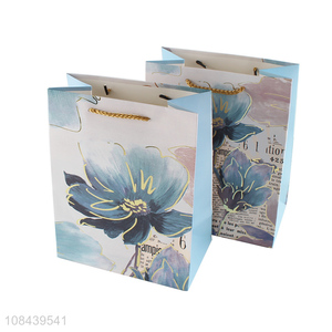 Latest products shopping bag paper bag gifts packaging bag