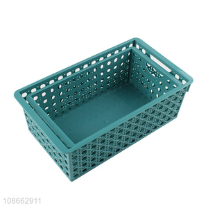 Wholesale rectangular hollowed-out plastic storage basket for kitchen bathroom