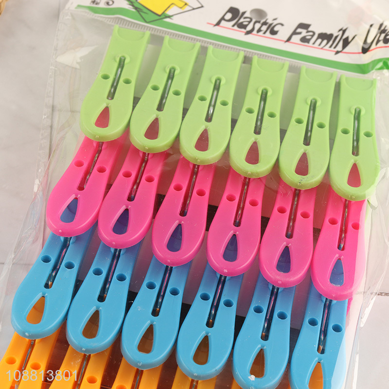 China imports 24pcs colored plastic clothes pins with spring