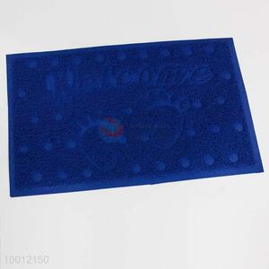 Blue welcome door mat with foor pattern