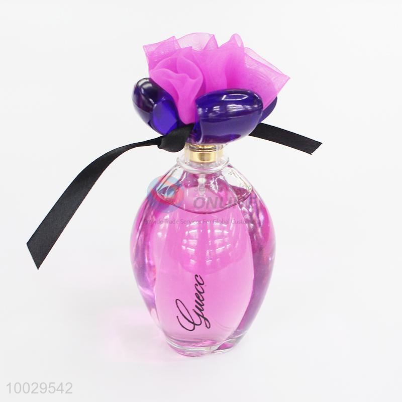 perfume purple bottle with flowers