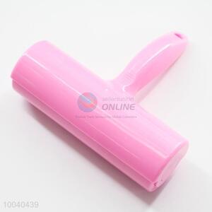 Pink lint roller/dust remover
