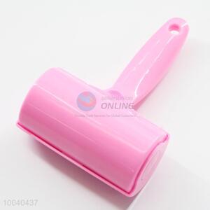 Pink mini lint roller/dust remover