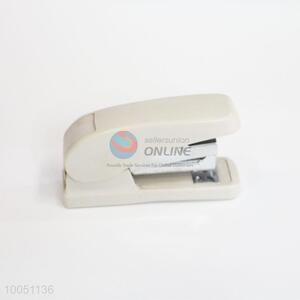 Beige stapling machine <em>book</em> <em>sewer</em> office space stapler