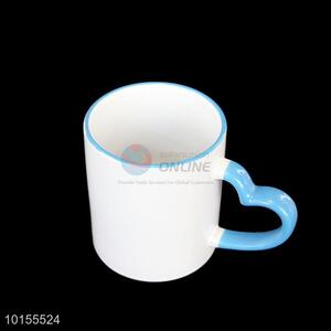 Wholesale white ceramic cup with loving heart shape blue handle