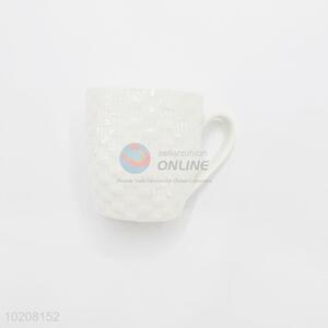 Simple embossed white ceramic tea mug