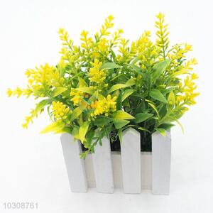 Comfortable artificial flower miniascape with wooden flowerpot for decoration