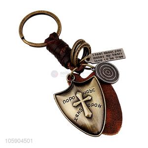 Wholesale cheap weave leather key chain with retro shield charms