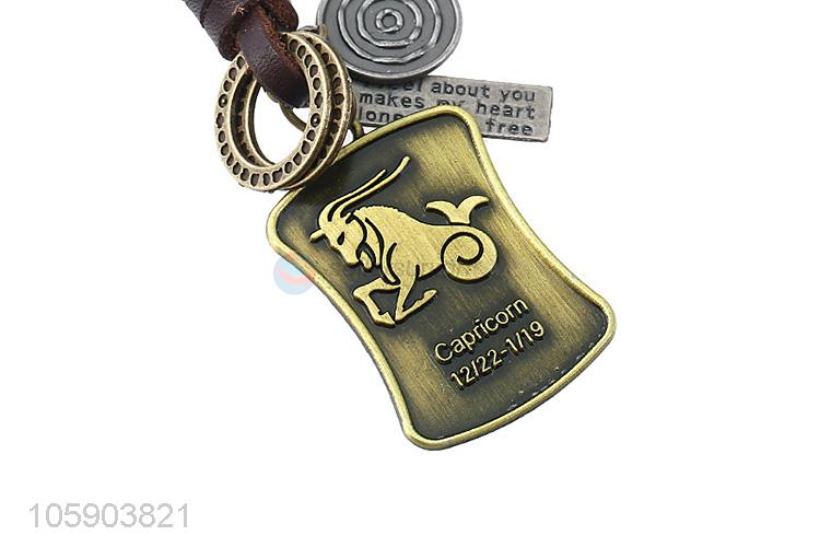China factory custom weave leather key chain with retro shield charms