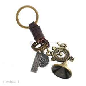 Bottom price weave leather key chain with retro alloy charms