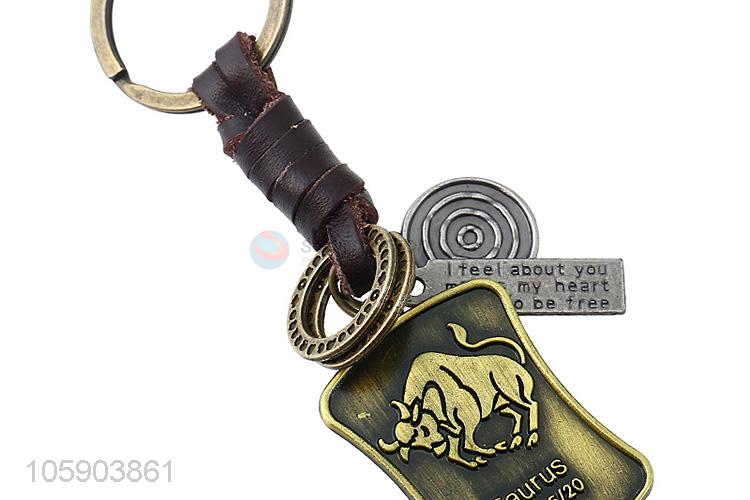 Wholesale new weave leather key chain with retro shield charms