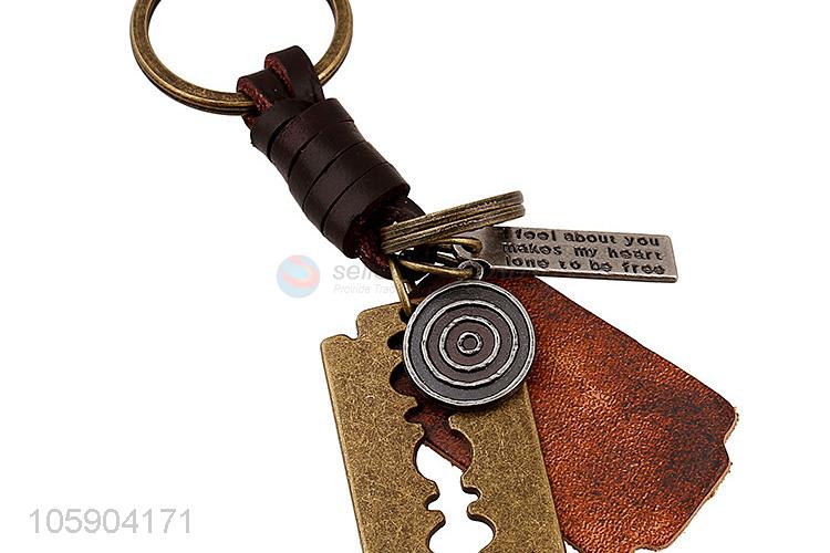 Customized cheap retro alloy blade pendant weaving leather key chain
