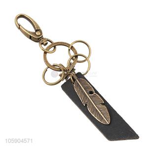 Manufacturer custom retro alloy feather pendant leather key chain