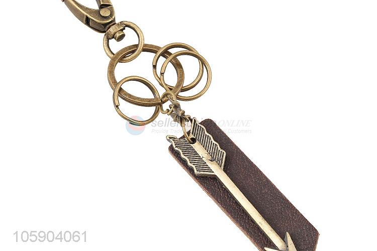 Factory sales weave leather key chain with retro arrow charms