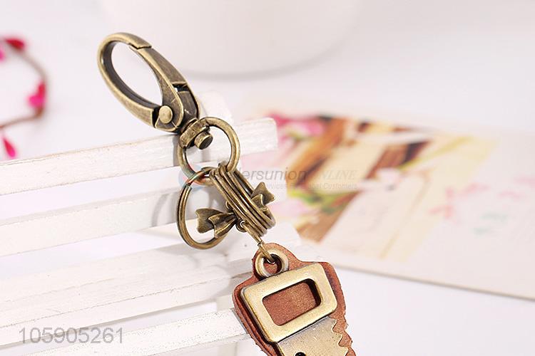 Made in China leather key chain with retro saw charms