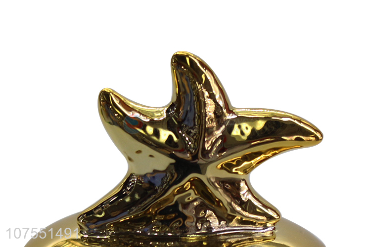 Unique Design Glass Storage Bottle With Gold Starfish Ceramic Lid