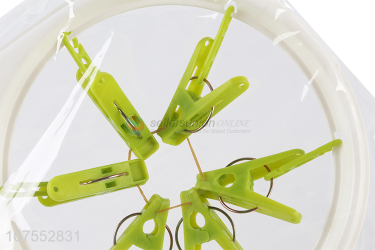 Factory price folding plastic clothes hanger with 14pcs clothes pegs