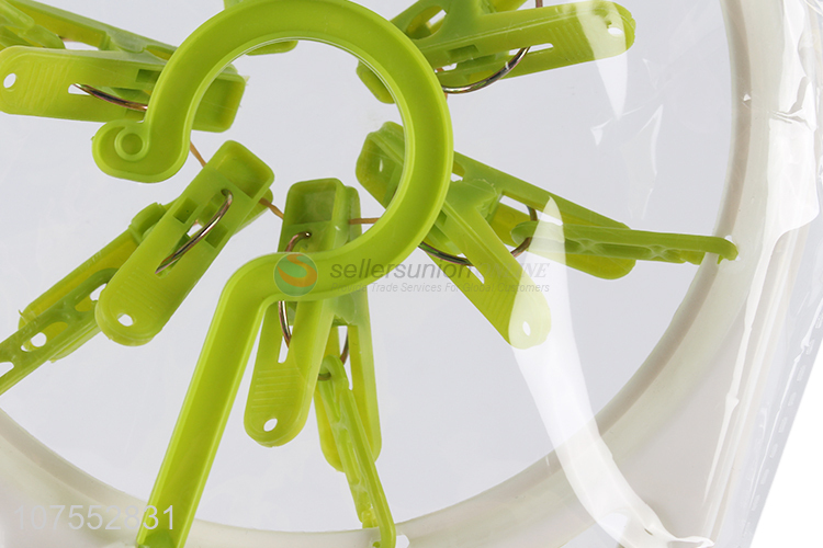 Factory price folding plastic clothes hanger with 14pcs clothes pegs
