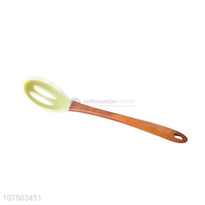 Wholesale cooking tool translucence silicone slotted spoon with wooden handle