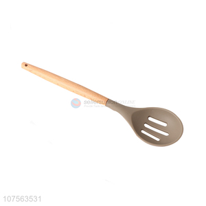 Promotional kitchen utensils wooden handle food grade silicone slotted spoon