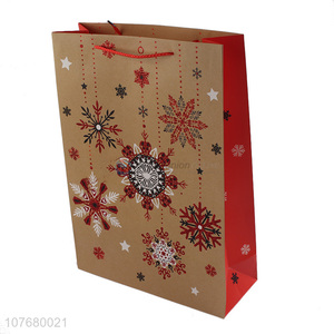 Hot yellow snowflake kraft paper gift packaging gift bag