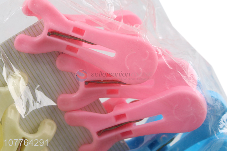 Hot sale 12 pieces plastic clothes pegs for home and laundry