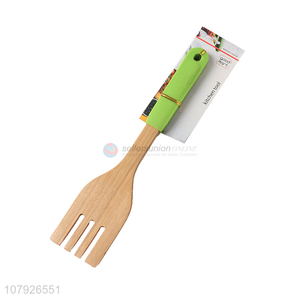 China factory kitchen tools healthy wooden slotted turner with rubber handle