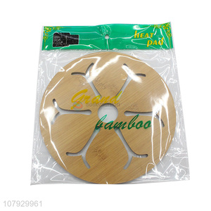 Low price wholesale yellow hollow wood carving potholder for kitchen