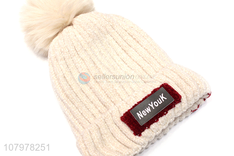Low price kids autumn winter fleece lined beanie with faux fur pom pom