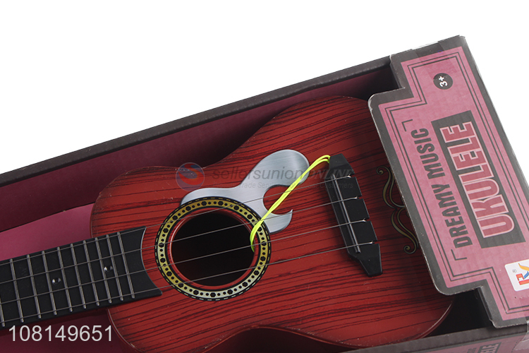Online wholesale 4 strings children toy ukulele kids mini guitar