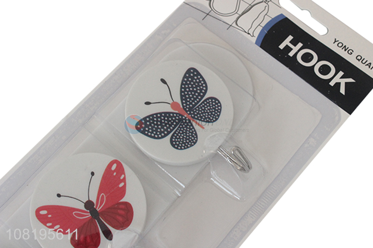 Wholesale butterfly hanging hooks plastic sticky hooks