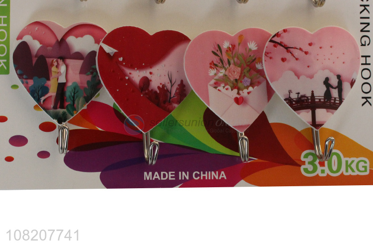 China products heart shape plastic wall mounted sticky hooks