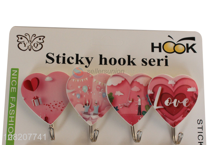 China products heart shape plastic wall mounted sticky hooks