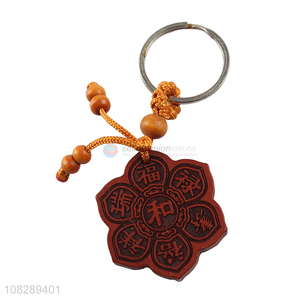 Factory supply flower shape wood carved keychain for daily use
