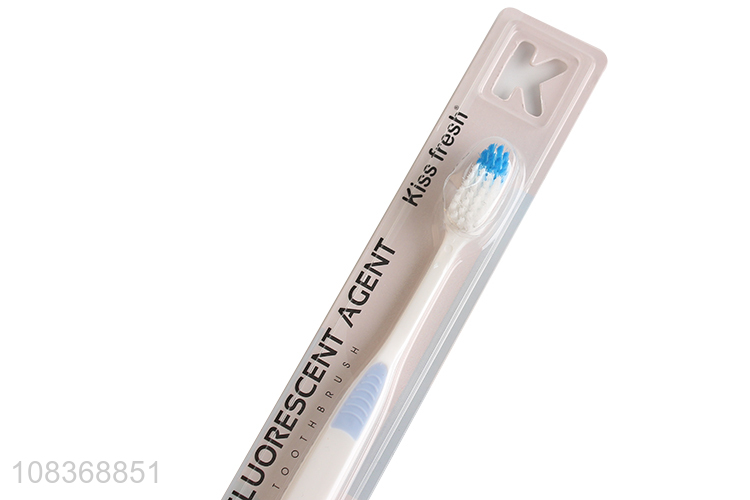 Bottom price soft nylon bristle toothbrush with ergonomic handle