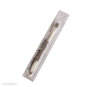 Hot sale medium bristle <em>toothbrush</em> with anti-slip plastic handle