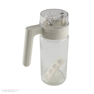 Wholesale 550ml glass oil dispenser bottle with automatic cap and stopper